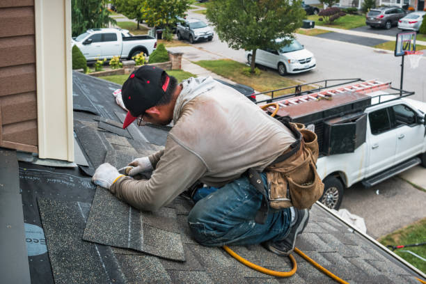 Professional Flat Roof Repair technician working in Byron, MI
